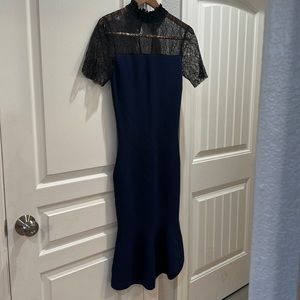 A gorgeous cocktail dress! Tubular rib-knit that is very flattering!